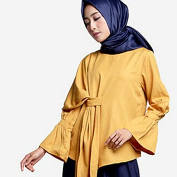 Baju Busana Muslim Berpita yang Menghias Tubuh dengan Indah